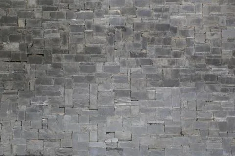 Old stone wall Texture in weathered and have natural surfaces. Foto stock