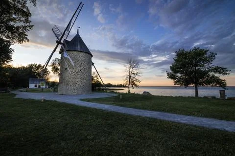 Old stone windmill with four blades. Stock Photos