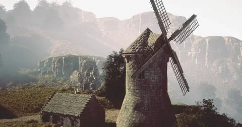 Old stone windmill overlooking rocky hills during morning light Stock Illustration