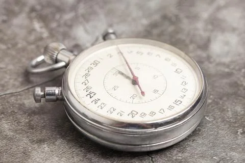 Old stopwatch on a gray background Foto stock