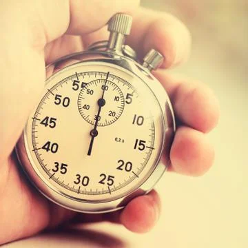 Old stopwatch on white background Stock Photos