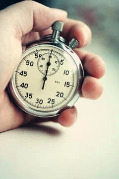 Old stopwatch on white background Stock Photos