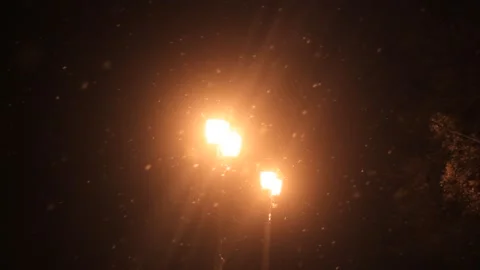 Old Street Light and Falling Snow Stock Footage 234789117