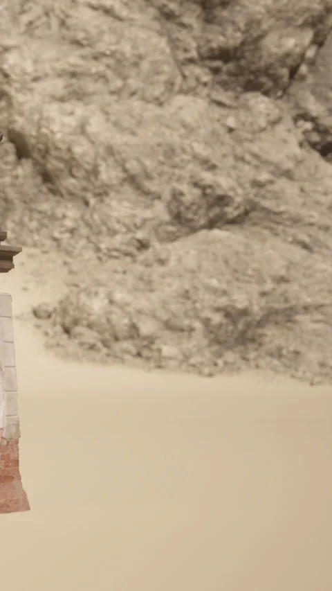 Old structure stands on sandy beach near rocky cliffs in bright sunlight Video stock 340257170