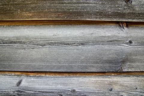 Old structured, weathered wooden wall as a texture or background Stock Photos