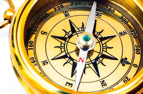 Old style brass compass Stock Photos