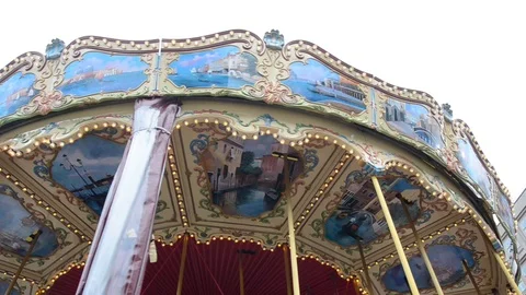 Old style carousel moving on square in Berlin. Close up of Christmas carousel Stock Footage 111220230