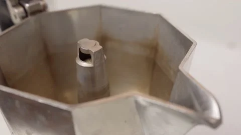 An old style coffee maker makes hot fresh espresso Stock Footage 130889709