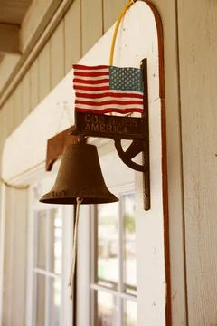 Old Style Doorbell on Shopfront Door with American Flag Stock Photos