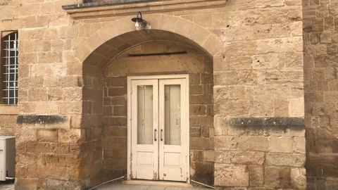 Old Style Lamp above Old Door Video stock 99853383
