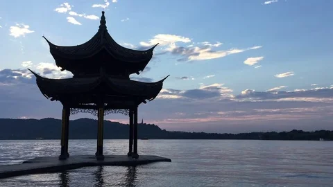 Old style pavilion on beautiful lake Stock Footage 79322221
