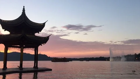 Old style pavilion on beautiful lake Stock Footage 79322572