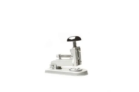 An old style stapler isolated on a white background with copy space Foto stock
