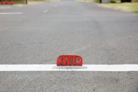 Old style street level stop sign Stock Photos