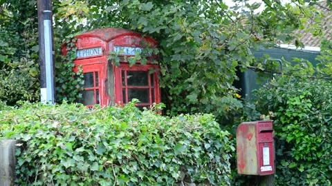 Old style telephone box and post box at Rievaulx Abbey UK Stock Footage 158759405
