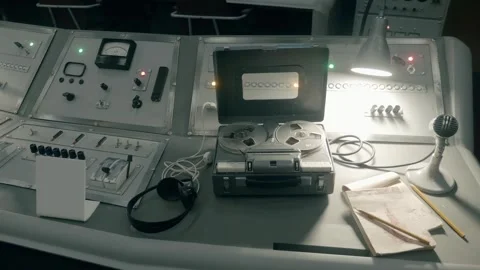 An old-style television studio center console with microphones, knobs, buttons Video stock 287960665
