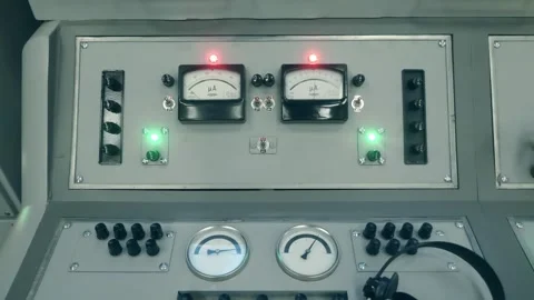 An old-style TV studio center console with microphones, knobs, buttons, gauges  스톡 동영상 287960627