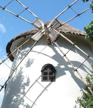 Old styled ukrainian windmill Stock Photos