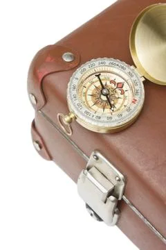 Old suitcase  and compass Stock Photos
