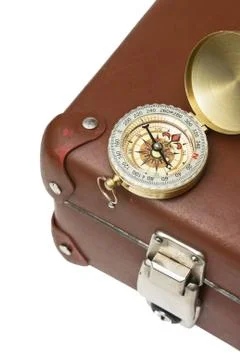 Old suitcase  and compass Stock Photos