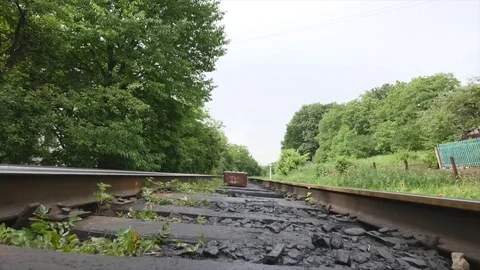Old suitcase on railway line Stock Footage 77406995