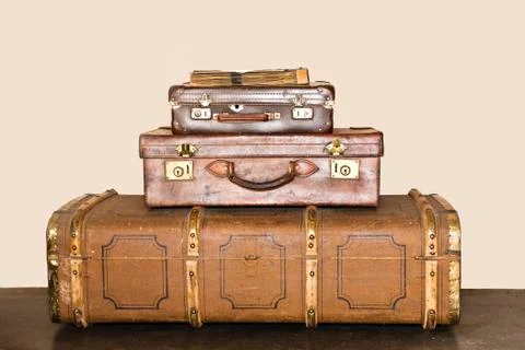 Old suitcases stacked up Stock Photos