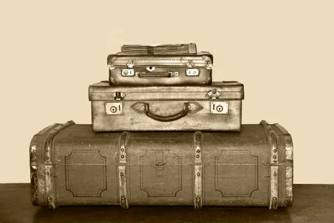 Old suitcases stacked up Stock Photos