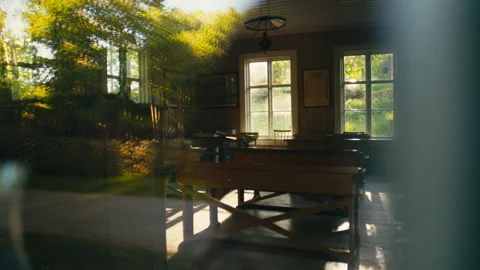 Old Sunlit Classroom Seen Through Window With Nostalgic Historic Atmosphere Stock Footage 338161255
