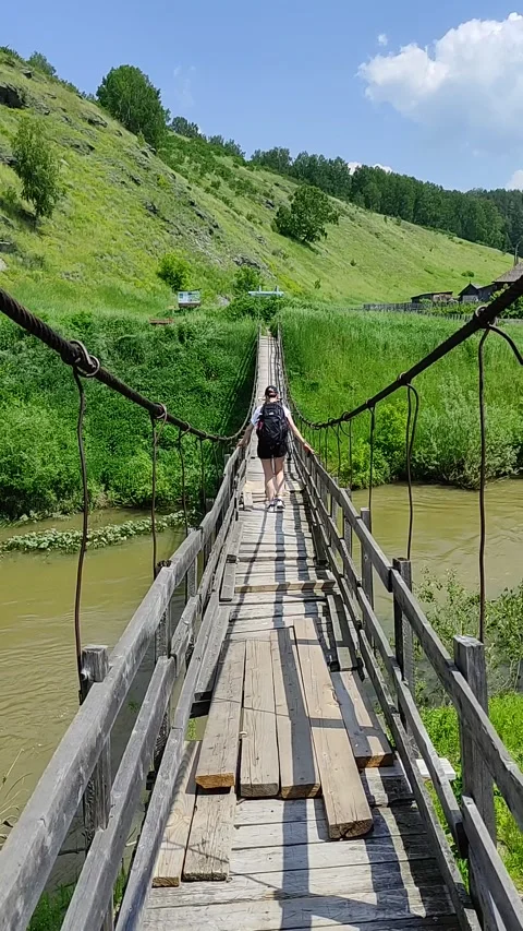 Old suspension bridge Stock Footage 279908965