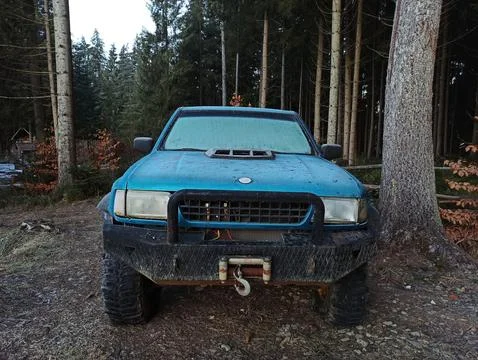 Old SUV car with winch, front view Stock Photos