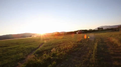 OLD SWATHER TRACTOR ON RANCH | GLIDECAM 스톡 동영상 34687070