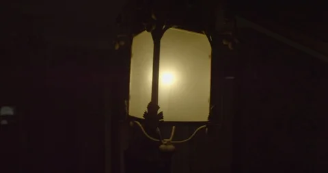 Old swaying lamp hanging from ceiling of stairs of creepy haunted house. Ghost, Video stock 110698875