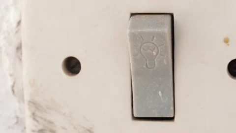 Old switch on the wall close up. 4K Macro detail. Stock Footage 155332501