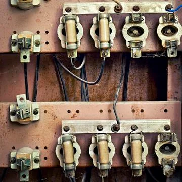 Old switchboard with fuses in the background Stock Photos