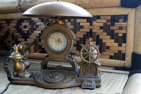Old table clock that has been damaged Stock Photos