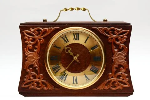 Old table clock with ornament Stock Photos