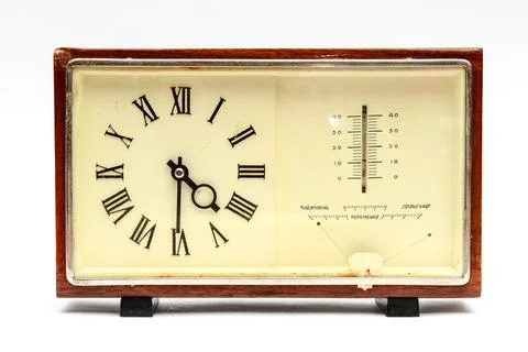 Old table clock with thermometer Stock Photos