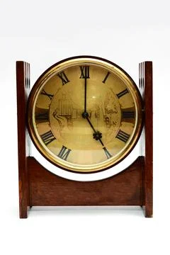 Old table clock on a white background Stock Photos