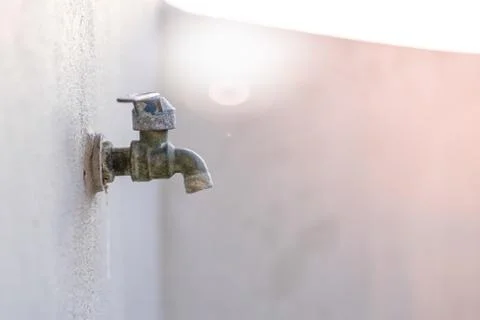 Old tap that is opening and running water , Water saving concepts Stock Photos