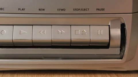 Old tape recorder, pressing the play button on an old tape recorder Stock Footage 265012725