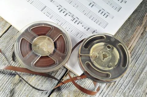 Old tapes with music notes Stock Photos