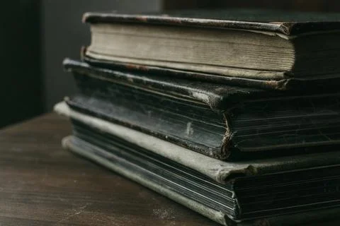 Old tattered books. A stack of antique books. Vintage books Stock Photos