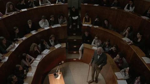 Old Teacher Lecturing in a University Stockbeeldmateriaal 75174588