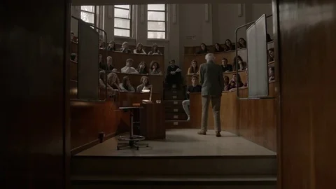 Old Teacher Lecturing in a University Stockbeeldmateriaal 75174609