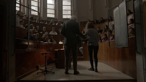 Old Teacher Lecturing in a University Stockbeeldmateriaal 75174630