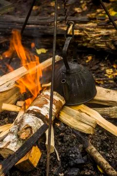 Old teapot on fire Stock Photos