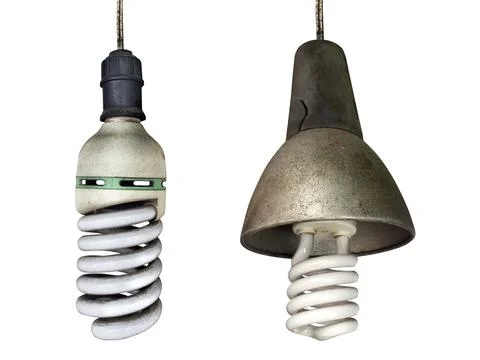 Old technology and wasting electricity, burned out light bulb Stock Photos