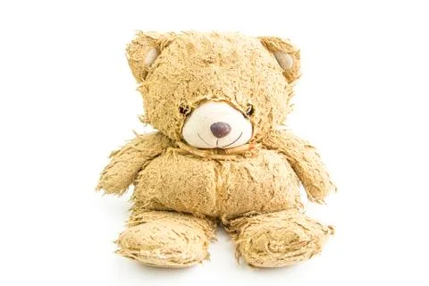 Old teddy bear with bow isolated. Stock Photos