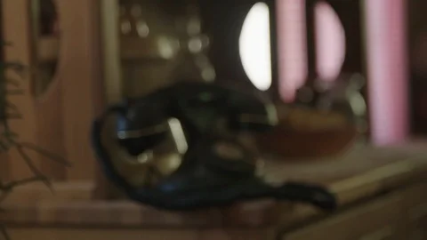 Old telephone on table Stockbeeldmateriaal 89343349