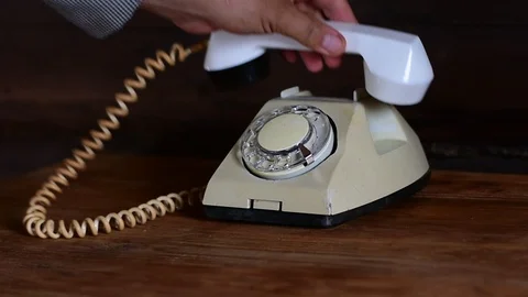 Old telephone on the table Stock Footage 114351319